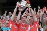 Armagh Captain Paul McGrane and team members John Toal and Kieran McGeeney lift the Anglo Celt at Croke Park on Sunday after winning the Ulster Final three years in a row. - Armagh v Donegal Ulster Final 2006