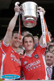 Armagh Captain, Paul McGrane and Paddy McKeever lift the Anglo Celt after winning the Senior Ulster Football Championship Final against Donegal at Croke Park. - Armagh v Donegal Ulster Final 2006