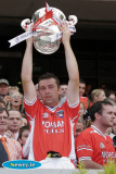 Oisin McConville lifts the Anglo Celt. - Armagh v Donegal Ulster Final 2006