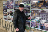 Michael Mallon recalls one of his photographs in the Newry Through the Years gallery which involved him leaning out from the top of St Mary's Church in John Mitchel Place. - Opening of Newry Through the Years Subway Gallery