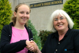 Geraldine McClory, principal, St Mary's High School, Newry, congratulates Kathryn Jennings who achieved 3 A Stars and 6 A's in her GCSE's. Photo: Columba O'Hare - Exam Results 2003