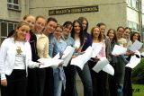 Pupils of St Mary's High School, Newry, celebrating their GCSE achievements. From left: Lisa Devine, Kathryn Jennings, Corrina McAleavey, Sarah Magee, Joanne Mathers, Michelle Kerr, Charolotte Magennis, Michelle McElroy, Karen Redmond, Coleen O'Connor, Denise McGivern, Ann Marie Kane, Bronagh O'Neill and Joan McClelland. Photo: Columba O'Hare - Exam Results 2003
