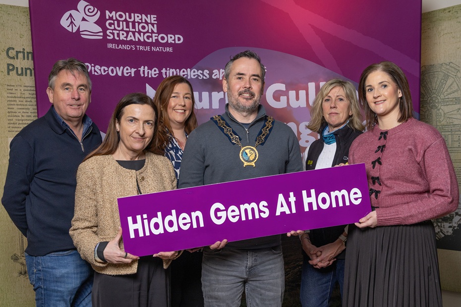 Newry, Mourne and Down District Council Chairperson, Councillor Philip Campbell is photographed with, from left: Stephen Magorrian, Denvirs of Downpatrick; Michelle Boyle, Head of Tourism Product Development and Visitor Experience NMDDC; Orla Hayes, Canal Court Hotel; Vicki Canavan, LIFE Adventure and Amanda Smyth, Assistant Director – Economy, Growth & Tourism NMDDC, to launch the Council’s ‘Hidden Gems at Home’ event in Down County Museum on 14 March.