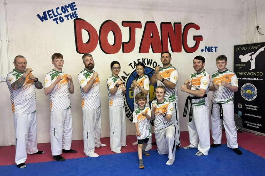 Chester’s proud big brother, wearing the lion along with other members of the CFTKD school.