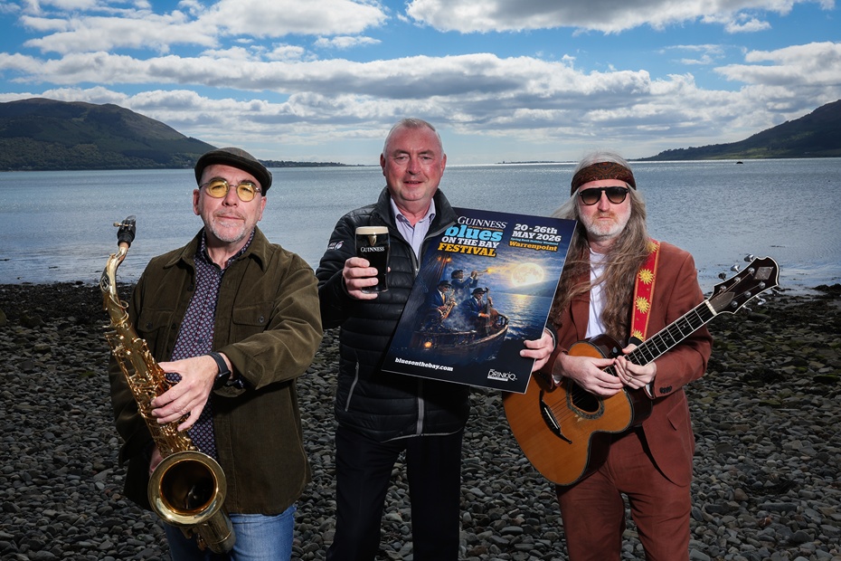 Blues on the Bay Director, Ian Sands, left, pictured with Paul Callan Diageo Northern Ireland and Festival performer Cormac Neeson