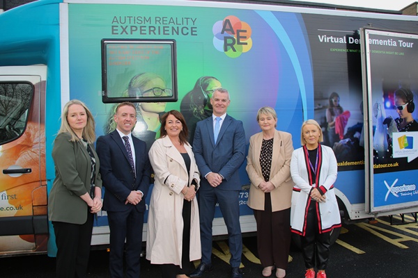 Staff from St Mark’s High School had the opportunity to take part in the Autism Reality Experience, an immersive, mobile training simulator designed to replicate sensory processing challenges associated with Autism. From left: Shirley Keenan-Hughes Crotlieve DEA, Conor Rodgers, Vice Principal St Mark’s High School, Councillor Selina Murphy, Aidan McGivern, Principal St Mark’s High School, Councillor Kate Murphy Chairperson Crotlieve DEA and Karen Crummy, Special Educational Needs Coordinator St Mark's High School. 