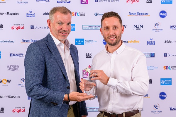 Health Matters Occupational Health won the Best Professional Services Business at the Newry Chamber Greater Newry Business Awards. Eamonn Connolly from Newry BID, sponsors is pictured presenting the award to Shaun Doran, Health Matters Director. Photograph: Colum Lynch Photography