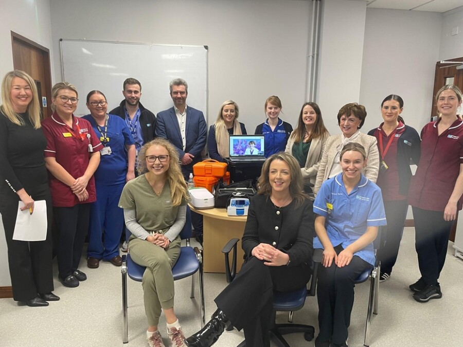 Chair of the Assembly Health Committee Liz Kimmins MLA & members pictured with Daisy Hill Acute Care at Home staff on the recent Health Committee visit to the hospital