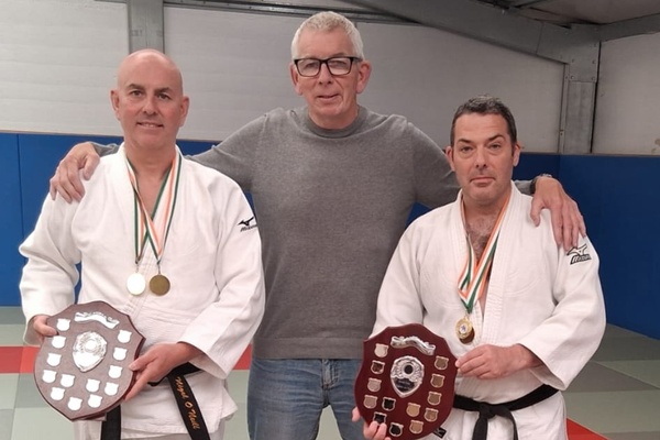 Nigel O’Neill and Damien O’Hare with Martin Savage
