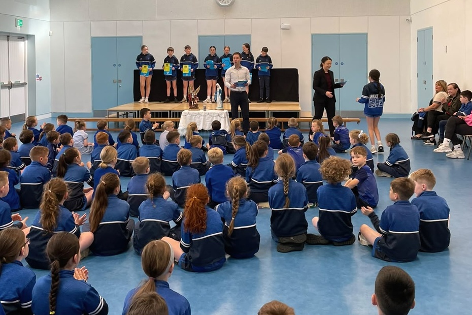 Infrastructure Minister Liz Kimmins MLA presents the Cycling Proficiency Certificates to pupils of Killean PS
