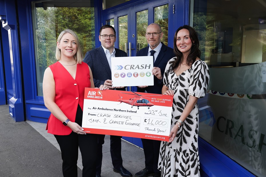 CRASH Services staff Michelle Murphy, Operations Director; Paul O’Hare, Finance Director and Steve Beighton, I.T Director present cheques to  Kerry Anderson, Head of Fundraising at Air Ambulance NI 