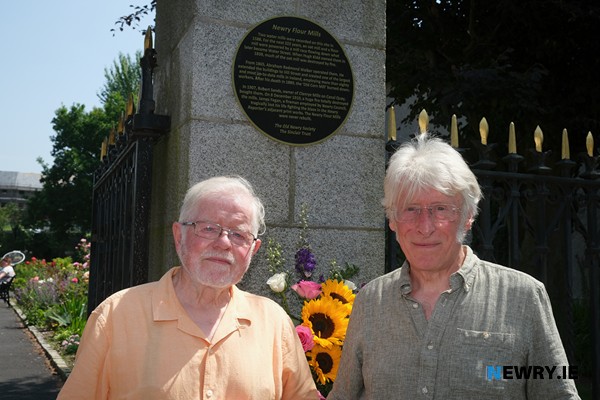 Tom Moore, Old Newry Society and Peter Sinclair, Sinclair Trust at the plaque unveiled at Newry Cathedral Garden the site of Newry Mills. Photograph: Columba O’Hare/ Newry.ie 