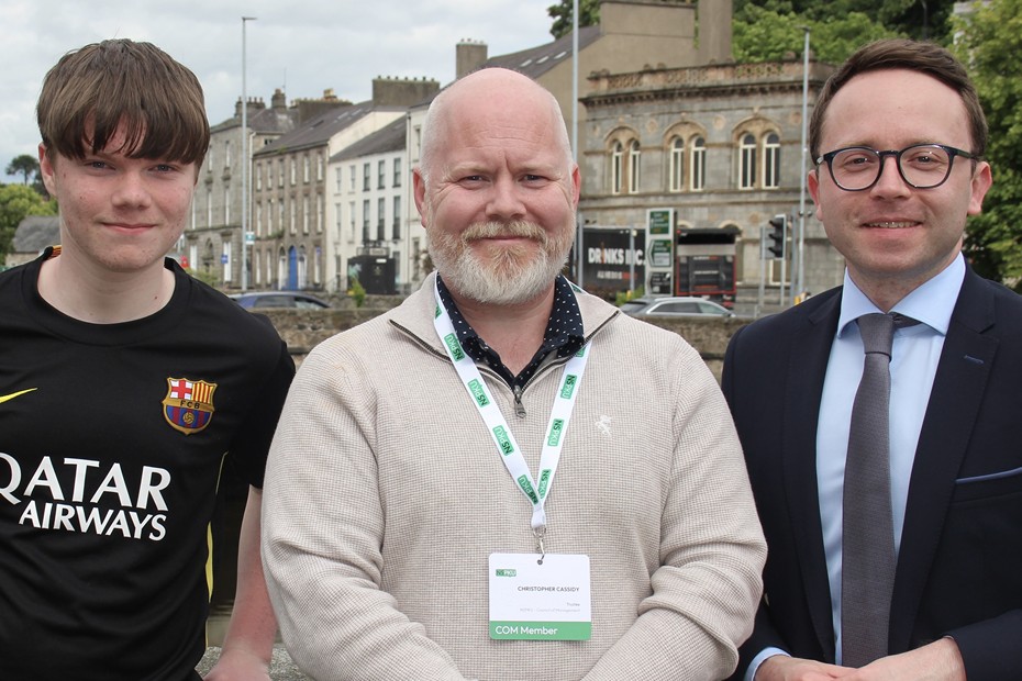 Daragh Cassidy and Chris Cassidy (Trustee of NSPKU) with Dáire Hughes MP