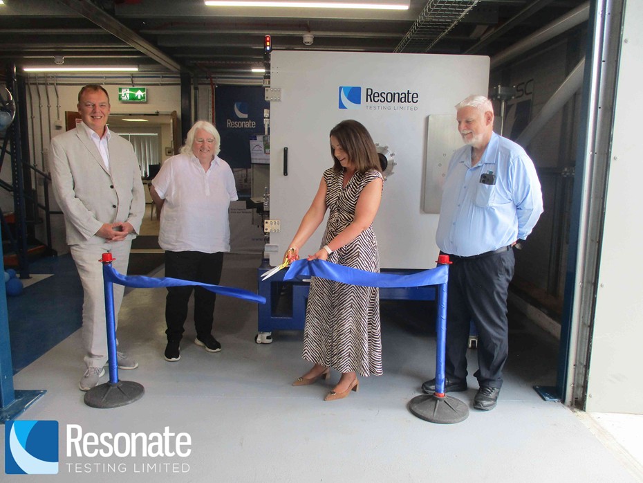 Infrastructure Minister Liz Kimmins cuts the tape on the new Resonate Testing facility.