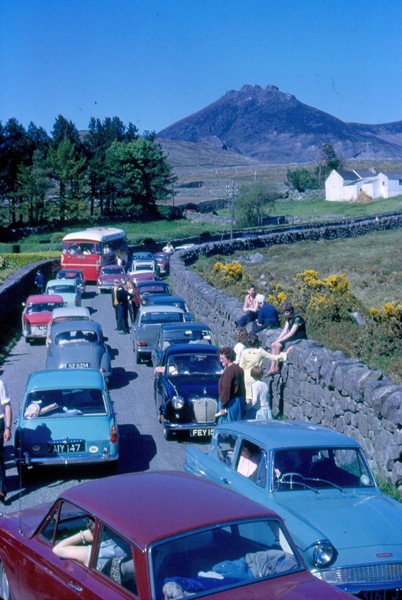 Photograph taken in June 1966 by Cecil Newman of cars outside the entrance to the Silent Valley in the Mourne Mountains. Newry & Mourne Museum, Newman Collection
