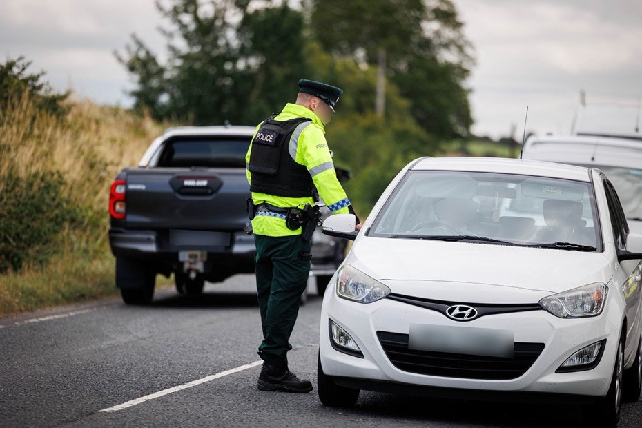 Police conduct a checkpoint on their 'All Out' day of action