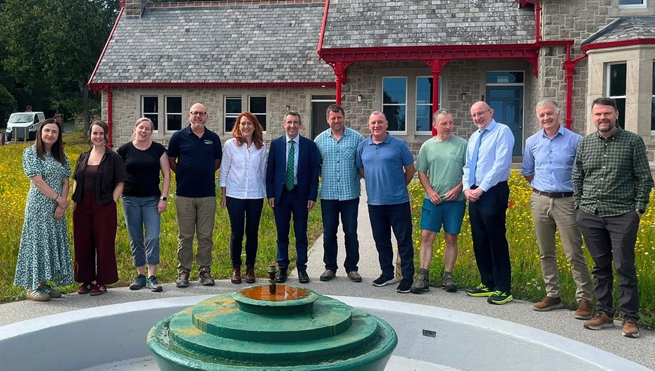 Members of the Forever Mournes Steering Group with Minister Muir and Andrew McMurray MLA. From left: Michelle Boyle (NMDDC); Alice Popplestone (Forever Mournes); Bernadine Maguire-Matthews (Forever Mournes); Nigel McKinney (Mourne Heritage Trust); Heather McLachlan (National Trust); Minister Andrew Muir (DAERA) ; Andy McMurray MLA; Patrick Nelson (National Trust); Vince McAlinden (Mourne Heritage Trust); Dr Mark Hammond (DAERA); Sean McCollum (Forest Service) and Patrick Lynch (National Trust)
