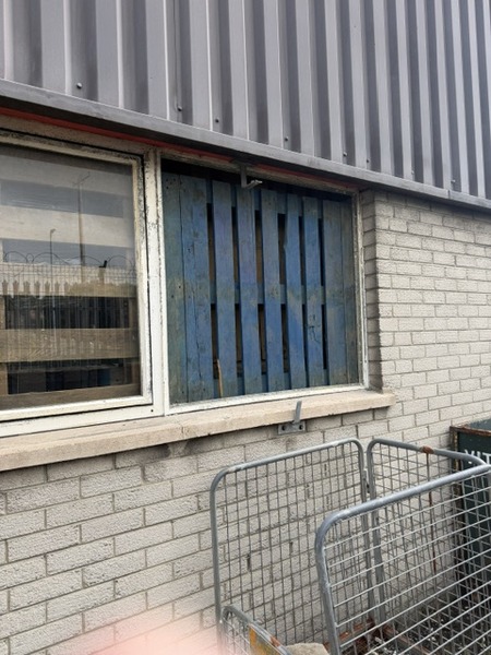 A broken window at the warehouse.