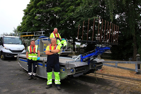Brendan McCabe aboard the new Truxor T50 vehicle with his Newry, Mourne and Down District Council colleagues Hugh Henry and Conor Quinn.