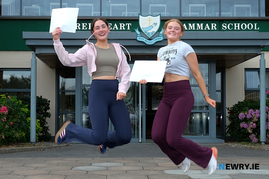 In joyful form at A Level results day at Sacred Heart Grammar School are twins Edana and Alene Butterfield from Mayobridge. Photograph: Columba O'Hare/ Newry.ie 