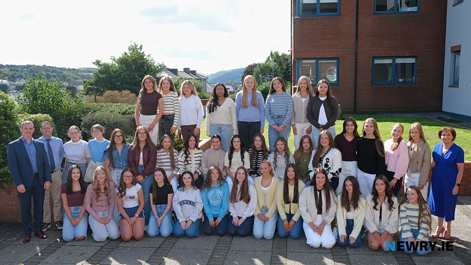 Pictured with Principal Mrs Fiona McAlinden and Vice-Principal Mr Thomas Hackett are some of our students who achieved a minimum of 8 A*/A grades: Molly Bellew, Clara Brewster, Chloe Coghlan, Isabella Curran, Blaithin Daly, Eva Demeca, Sarah Doherty, Emma Duffy, Ellie Farrell, Lucy Flynn, Naoise Grant, Aoibheann Harding-Lester, Angeleena Jophin, Meagan Kearney, Clare Keeley, Laura Kieran, Kiera Knox, Grace Lunny, Aoife Martin, Méabh McAleenan, Kate McCaffery, Faye McCreesh, Emily McElvanna, Ellie McEvoy, Tess McGouran, Sarah McGrath, Anna McKeown, Maeve McKinley, Kate McNeela, Ava McPolin, Leah McPolin, Ava O'Hagan, Lily-Ann O'Loughlin, Molly O'Neill, Sadie O'Neill, Ruby Quinn, Hollie Rice, and Eva-Jane Watras. Missing from the photograph are: Freya Coffey, Eithne Dunbar, Ellie Henning, Ava McWilliams, Kaja Rak, Evie Rogers, Eva Ryan and Grace Ryan.