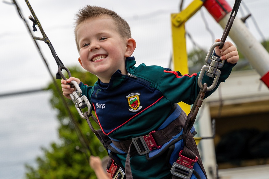 Reaching new heights and loving every bounce on the trampolines at the Three Ways Community Festival Funday!