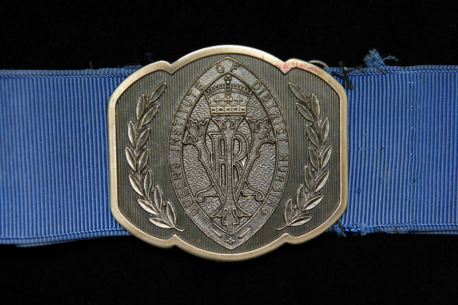 Queen’s Institute of District Nursing belt buckle.   Down County Museum Collection.