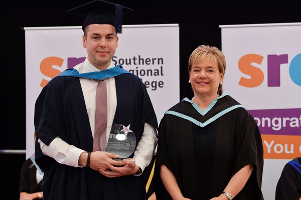 SRC graduate Neil King from Warrenpoint has been presented with the full-time ‘Student of the Year’ Award for the Faculty of Building, Engineering & Technology, kindly sponsored by MTM Engineering. Neil graduated with a BEng (Hons) in Engineering and is pictured receiving his award from Hilary Singleton, Vice-Chair of the SRC Governing Body.