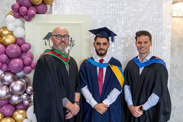 Yousef Al Mahamed pictured beside SRC Sports and Exercise staff Mark Copeland and Stephen Ferris. 