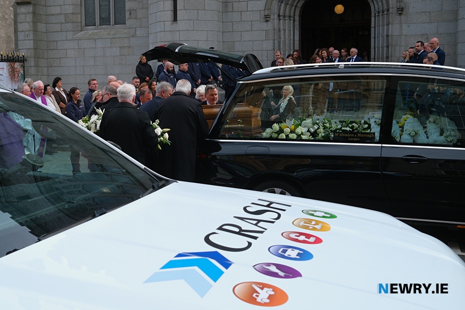 Michael McKeown's remains leave Newry Cathedral following his Requiem Mass.