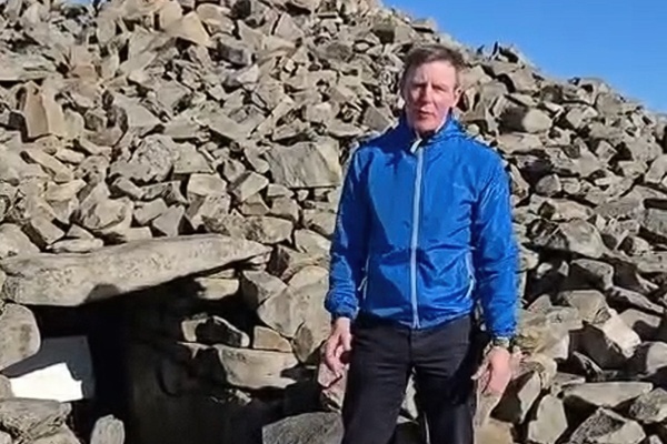 Justin McNulty MLA at the summit of Slieve Gullion