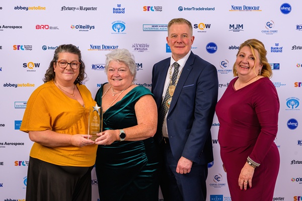 Women's Aid Armagh Down were the winners of the Best Charity Award at the Greater Newry Business Awards. Conor Patterson, Newry and Mourne Co-operative and Enterprise Agency is pictured with the winners. Photograph: Colum Lynch Photography