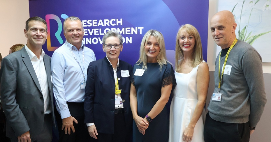 Dr Steven Austin, Medical Director; Simon Gibson, Assistant Medical Director; Eileen Mullan, Chairperson; Mairead McLogan, Clinical Trial Participant; Professor Patricia Campbell, Medical Director for Research, Development and Innovation; and Steve Spoerry, Chief Executive, at the opening of the Commercial Research Delivery Centre.
