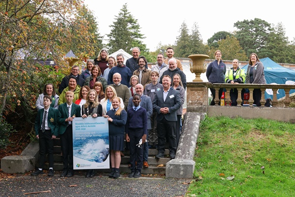 Newry, Mourne and Down District Council officials at the launch of the new Sustainability and Climate Change Strategy at Castlewellan Forest Park with representatives from a number of organisations including Sustainable NI, Climate NI and the Dolmens Climate Action Network and students from local schools.
