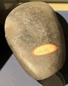 Early Neolithic porcellanite axe, dating to c. 4500 BC and found near Dundrum, County Down. On loan from Ulster Museum courtesy of the National Museums of Northern Ireland.