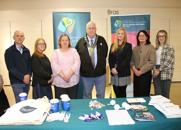 Newry, Mourne and Down District Council Head of Environmental Health James Campbell (left) with Council Chairperson, Councillor Glyn Hanna. Included are NMDDC officials Denise Cronan (Home Safety Officer), Catherine Lynch (Well-Being Department), Tara Smyth (Age Friendly Co-ordinator), Alison Collins (Senior Environmental Health and Wellbeing Officer) and Alannah Brennan (Health Improvement Officer).