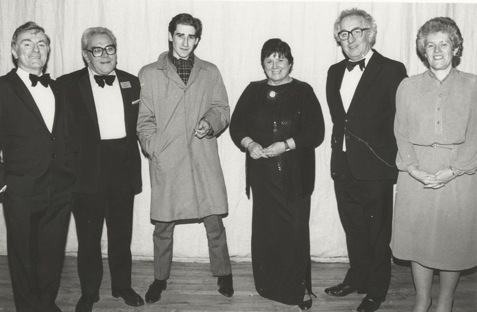 Photograph of the Newry Drama Festival Committee with adjudicator Anna Manahan and guest John Lynch, 1985. Newry and Mourne Museum Collection.