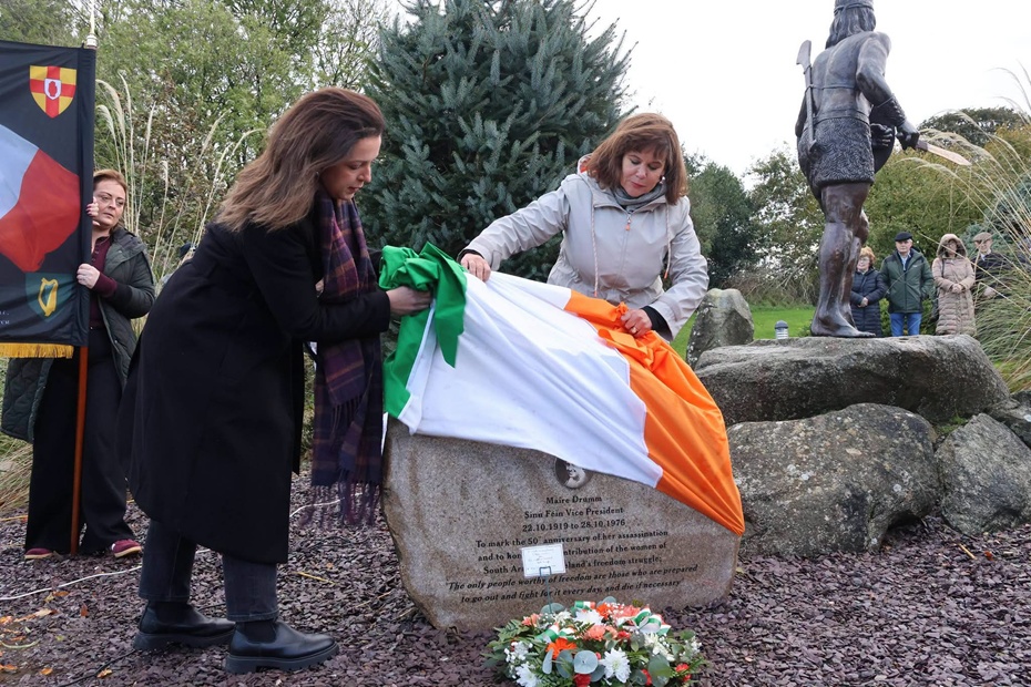 Sinn Fein President Mary Lou McDonald and Newry and Armagh MLA Liz Kimmins unveiling a stone in memory of Máire Drumm.