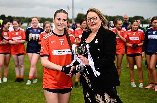 Armagh captain Gemma Marsden is presented the cup by Trina Murray, LGFA President, after the LGFA All-Ireland U14 Bronze Final match between Limerick and Armagh at Coralstown/Kinnegad GAA in Westmeath. Photo by Ben McShane/Sportsfile
