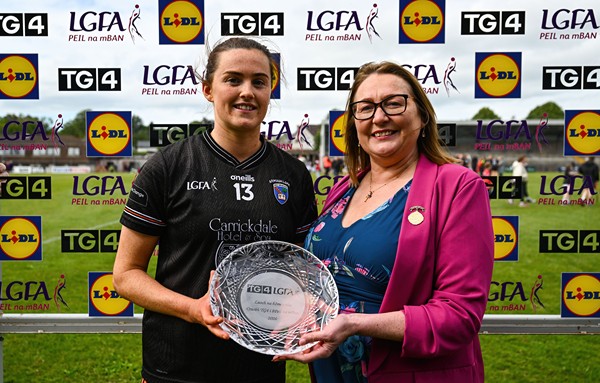 Aimee Mackin of Armagh receives the Player of the Match award from LGFA President, Trina Murray, following the LGFA TG4 All-Ireland Senior Championship Round 1 match between Cork and Armagh at Páirc Uí Rinn in Cork. Photo by Tyler Miller/Sportsfile