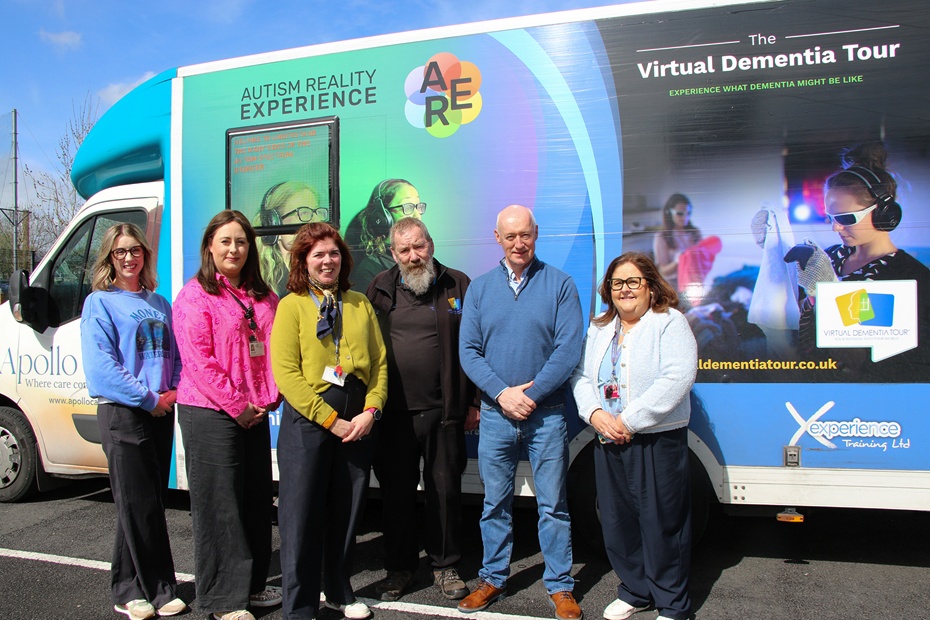 Staff from St Paul's High School Bessbrook take part in the Autism Reality Experience simulator. From left: Alannah Brennan, NMDDC Inequalities Officer, Aoife McComiskey, Slieve Gullion DEA Coordinator, Marian McMahon, Specialist Provision Lead at St Paul’s High, John Sanders Training 2 Core, Councillor Declan Murphy and Maria Wilson, Senior Leader Special Needs and Inclusion at St Paul's High School.