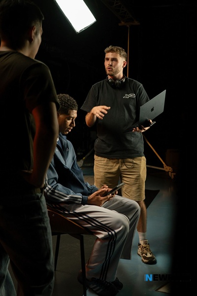 John Reavey at work directing his latest football project.
