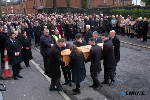 Mickey Brady's remains are carried into St Catherine's Dominican