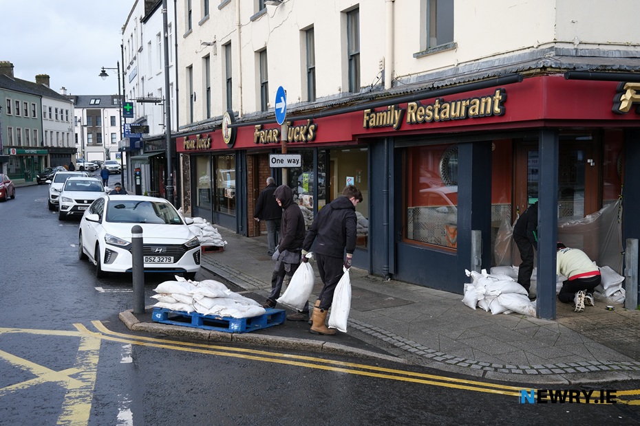 Placing sandbags at Friar Tucks in Sugar Island. Photograph: Columba O'Hare/ Newry.ie 