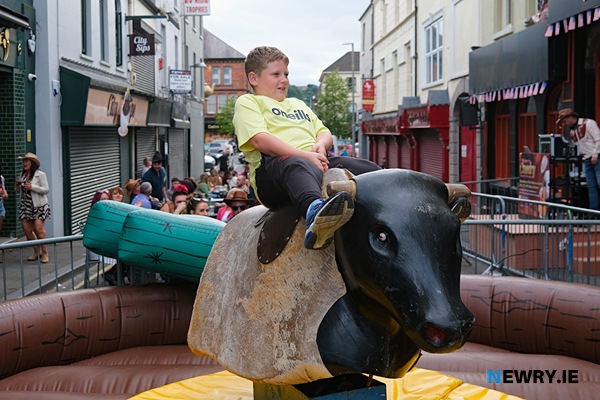Having a go on the Buckin Bronco at The Phoenix. Photograph: Columba O'Hare/ Newry.ie 