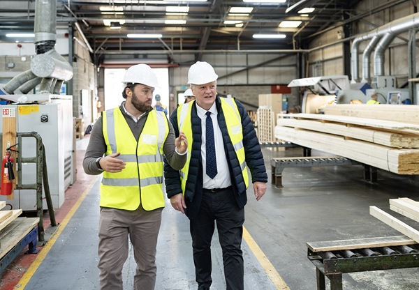 Rob Haldane, Haldane Fisher Newry General Manager and fourth-generation shareholder; Huw Pill, Chief Economist, Executive Director for Monetary Analysis and a member of the Monetary Policy Committee pictured during a site tour of Haldane Group’s Newry site - the largest hub for the company’s extensive timber importing, manufacturing, and distribution operations.