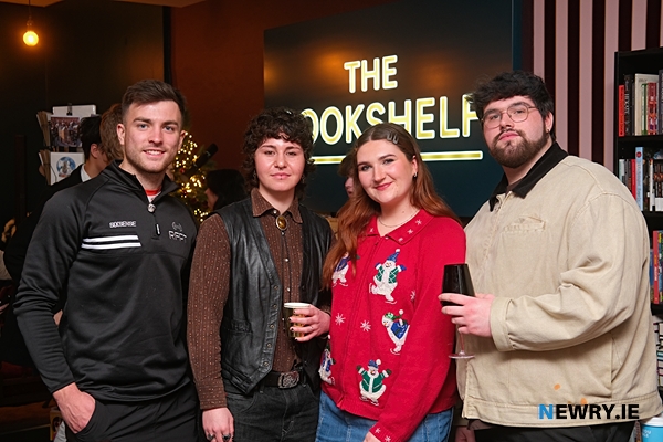 Visitors to The Bookshelf for the launch of c0mm0n magazine.