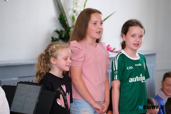Anna Farrell, Lucy Rice and Nora Jackson singing at Avila Nursing Home Bessbrook as part of a Newry Chamber music  event with children from Flynn Performing Arts. Photograph: Columba O'Hare/ Newry.ie 