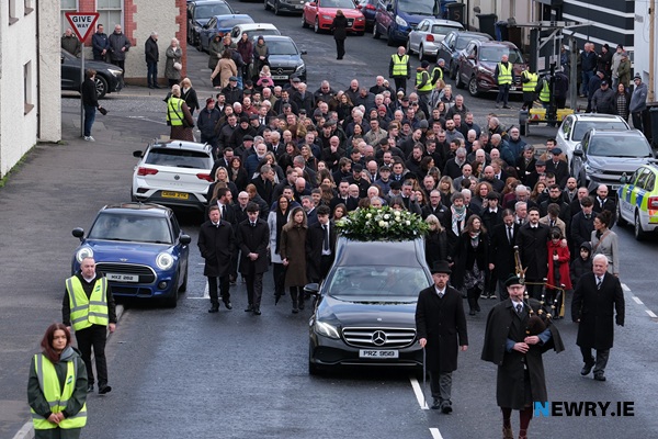 The Funeral cortege travels up Catherine Street.