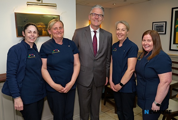 Killean Playschool staff with GAA President Jarlath Burns.